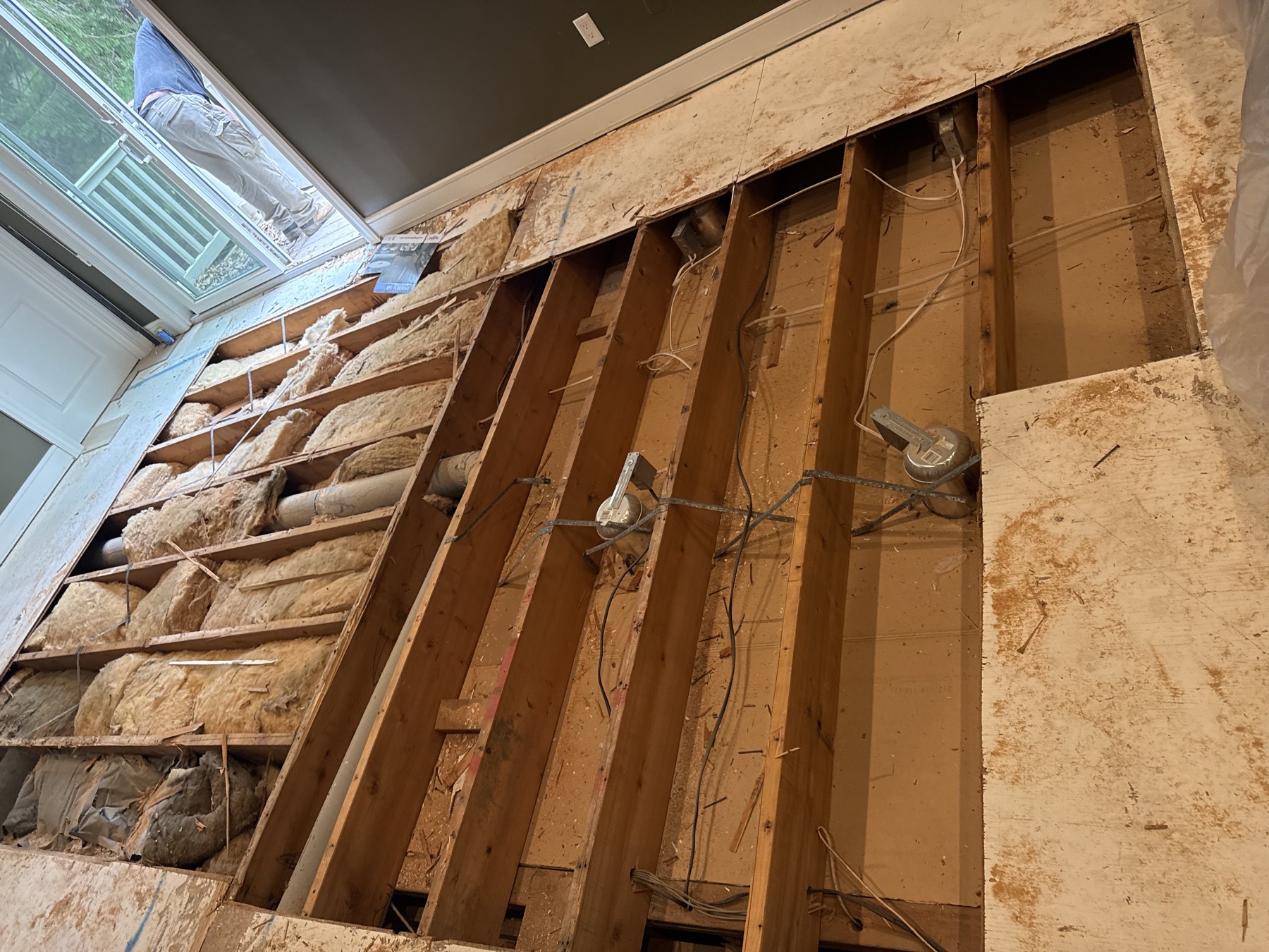 Interior renovation work with exposed framing