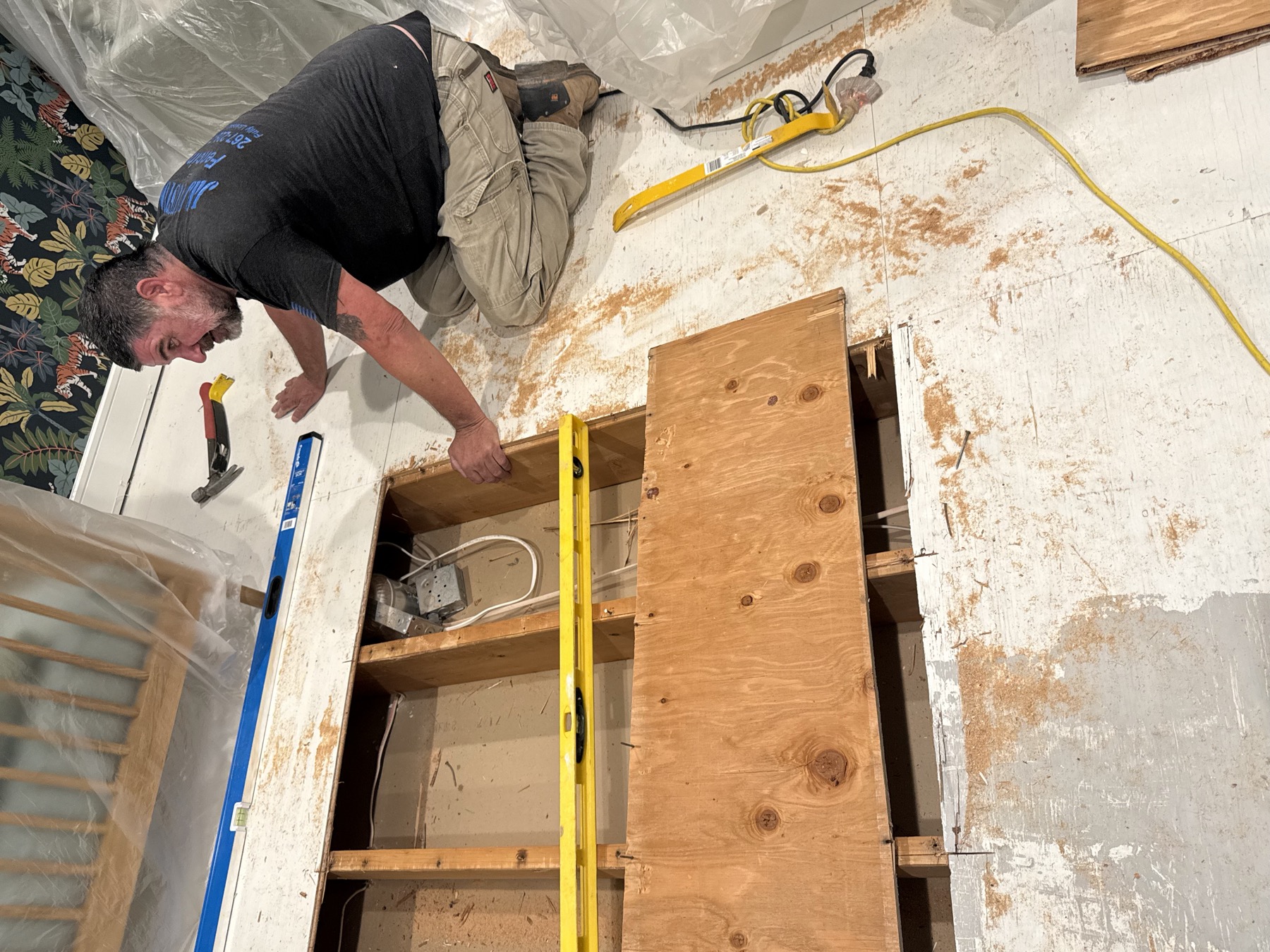 Room renovation with tools and materials staged